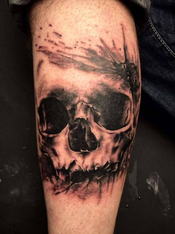Tatuaje de calavera en brazo