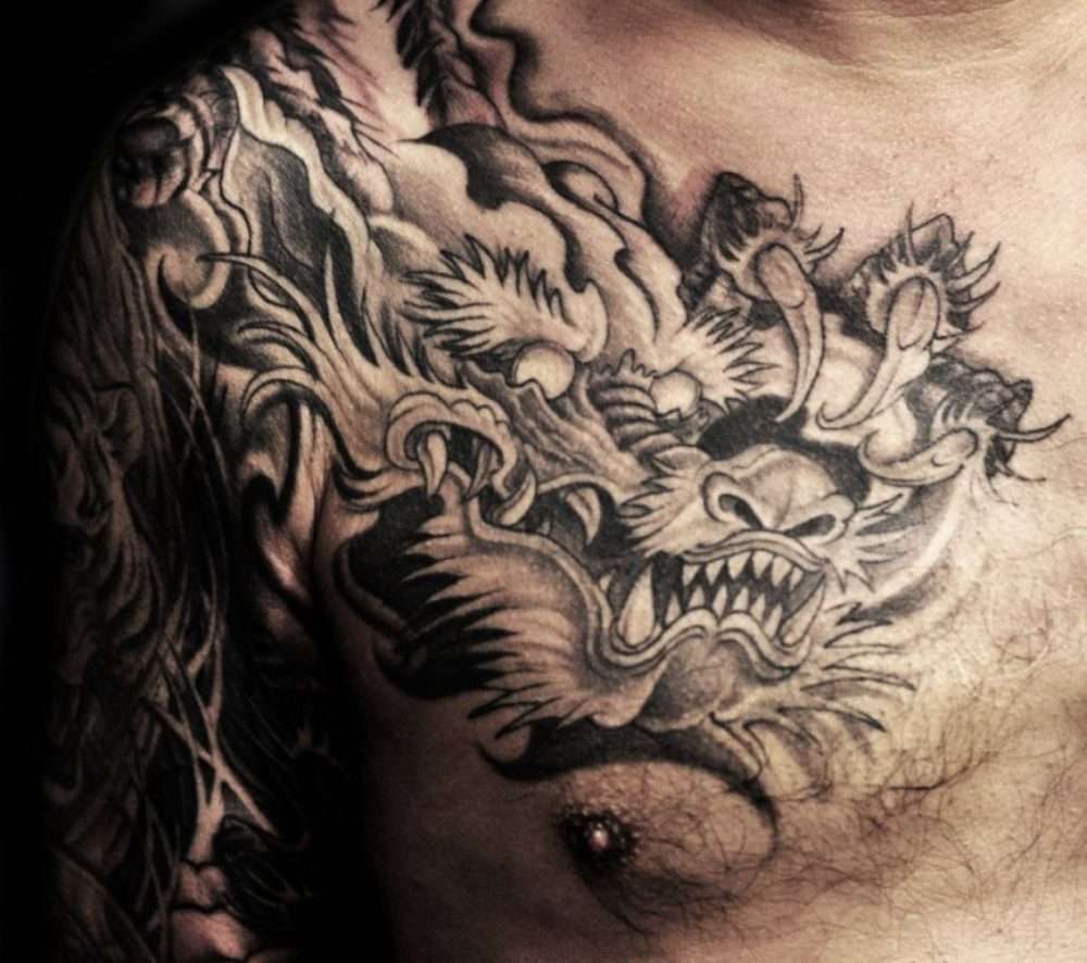 Tatuaje de dragón blanco y negro