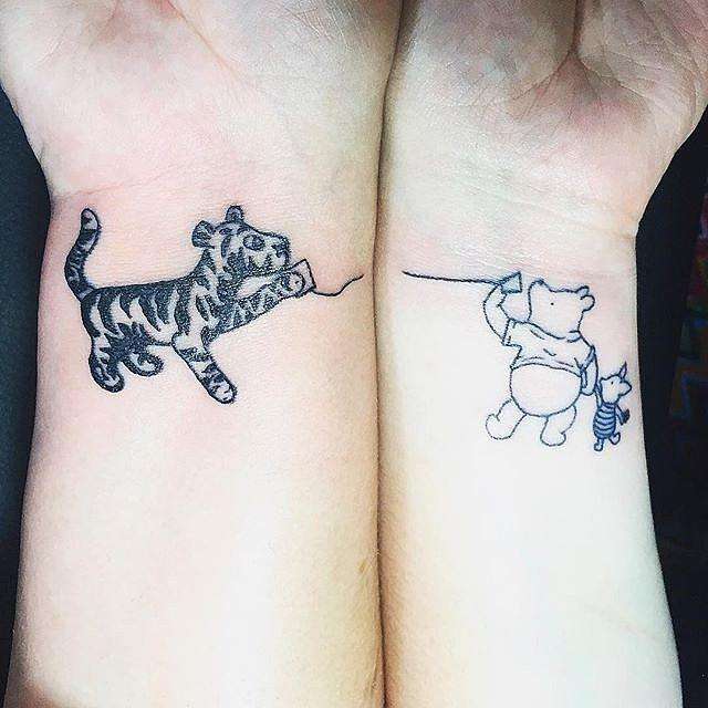Tatuaje madre e hija Winnie Poo