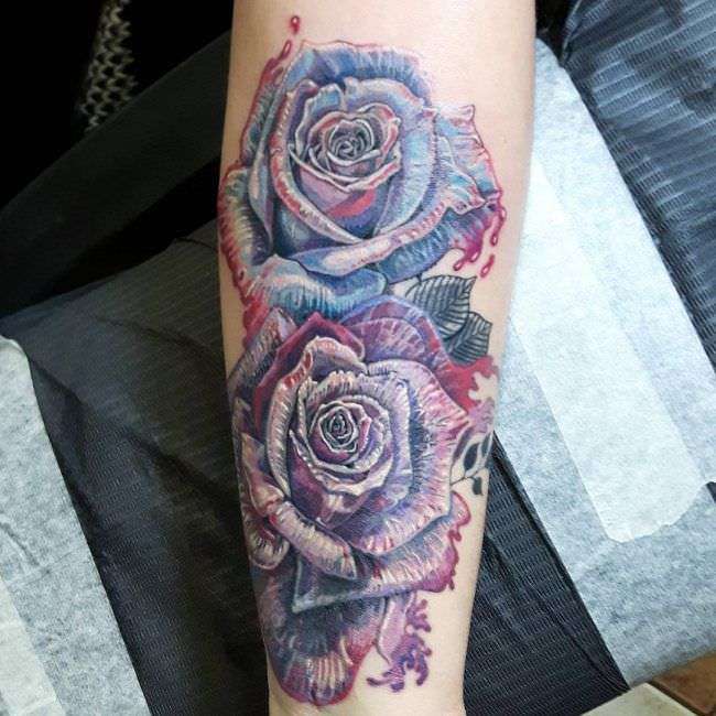 Tatuaje rosas en antebrazo