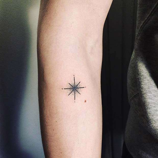 Tatuaje de una sola estrella en brazo