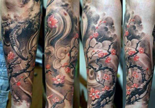 Tatuaje flores de cerezo sobre fondo gris