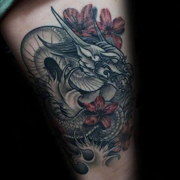 Tatuaje flores de cerezo y dragón