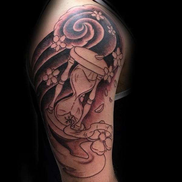 Tatuaje flores de cerezo y reloj de arena