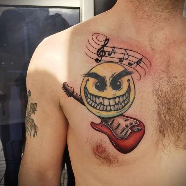Tatuajes de música: guitarra y emoticono