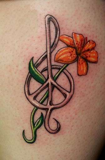 Tatuajes de música: clave de sol y flor