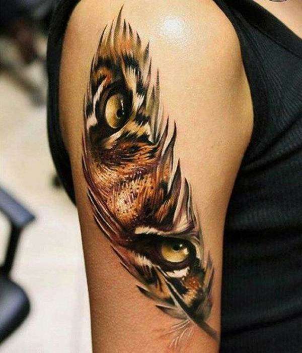 Tatuaje de pluma con ojos de tigre