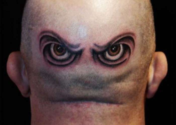 Funny tattoos: eyes in the neck