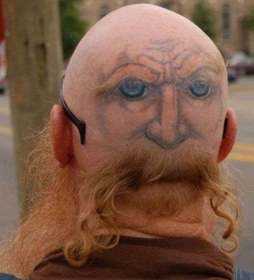 Funny tattoos: face on the back of the head