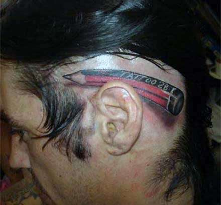 Funny tattoos: pencil in the ear