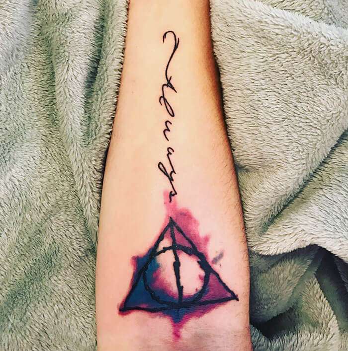 Tatuaje de Harry Potter en antebrazo