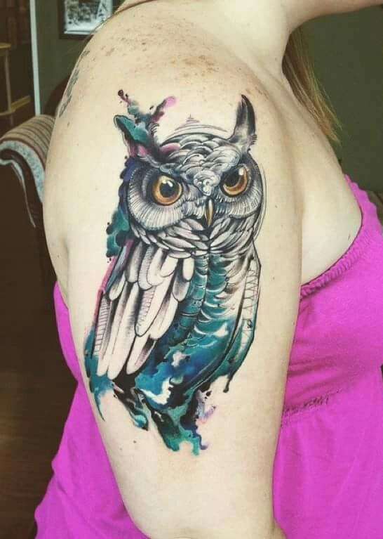 Tatuaje de búho en el brazo