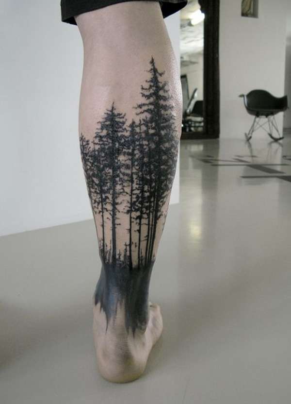 Tatuaje de bosque en pantorrilla