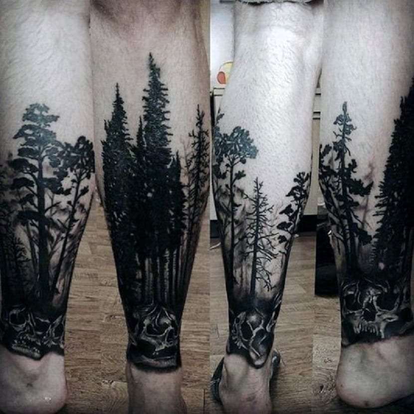 Tatuaje de bosque en la pantorrilla