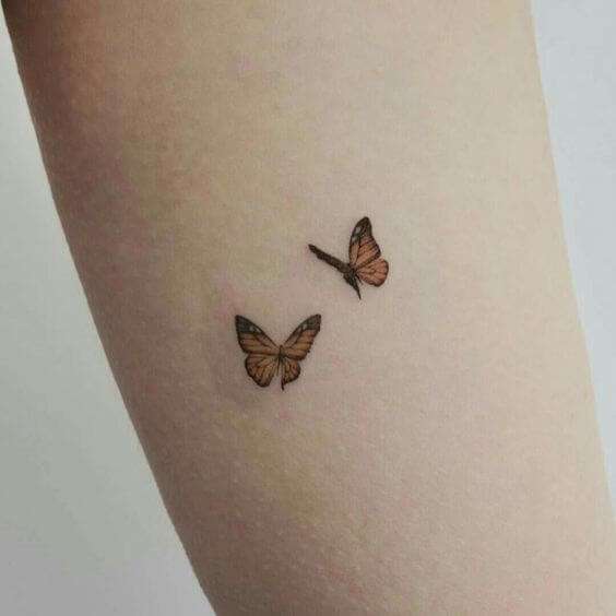 Tatuaje de mariposas pequeñas
