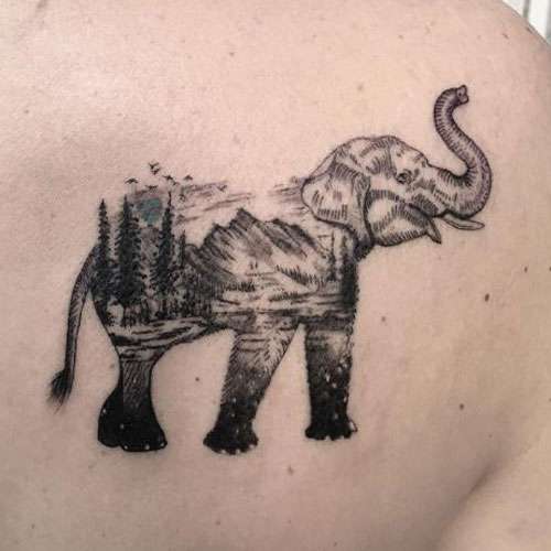 Tatuaje de elefante y paisaje