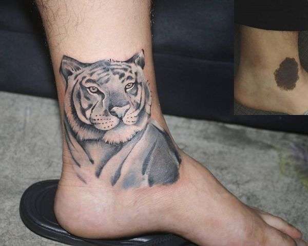 Tatuaje de tigre en el tobillo