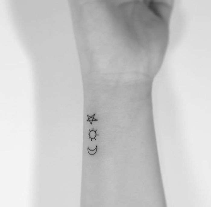 Tatuajes minimalistas: sol, luna y estrella